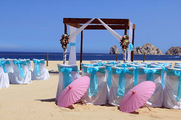 Beach wedding ceremony set up in Cabo San Lucas. Also available in vertical.