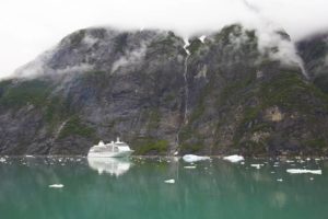 Alaska_Cruise_Ship_Under_Mountain_with_Clouds-cm