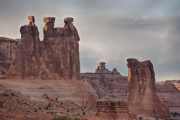 The Courthouse Towers is a collection of tall stone columns located in Arches National Park.