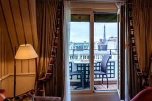 Cosy Paris hotel room with balcony and beautiful view at Eiffel tower and city-cm