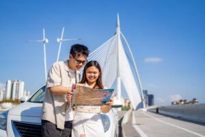 Couple Exploring City with Map by Modern Bridge -cm