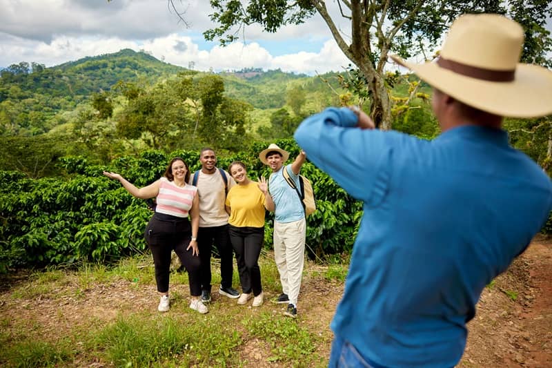Young tourists visiting Dominican coffee plantation-cm